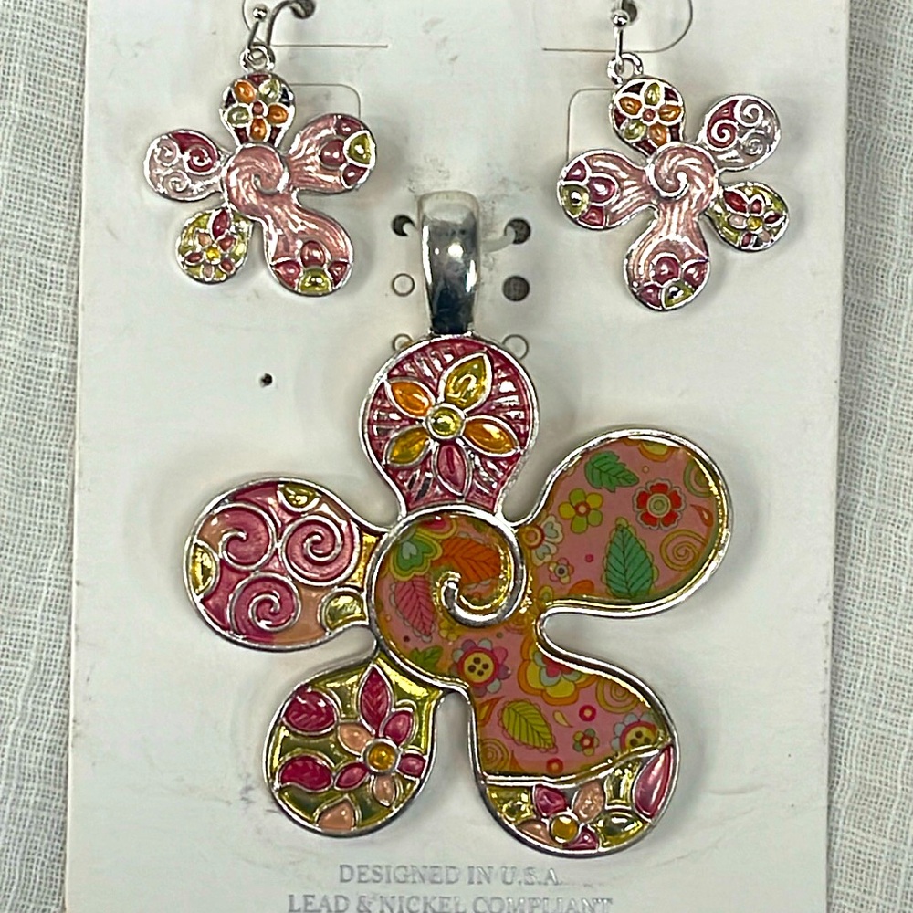 Flower silver pendant with matching earrings by icon collection